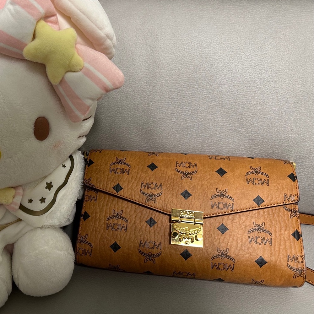 MCM Tan and Black Monogram Clutch